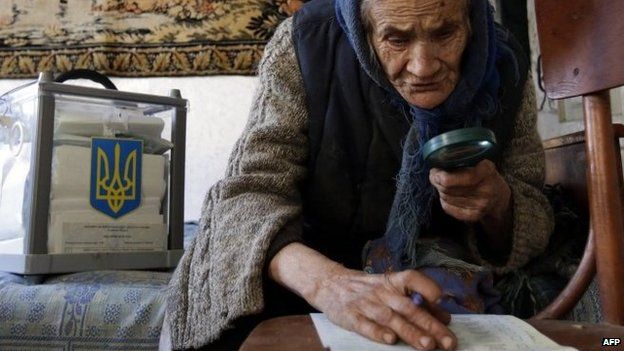 Elderly woman votes at home in village north of Kiev - 26 October