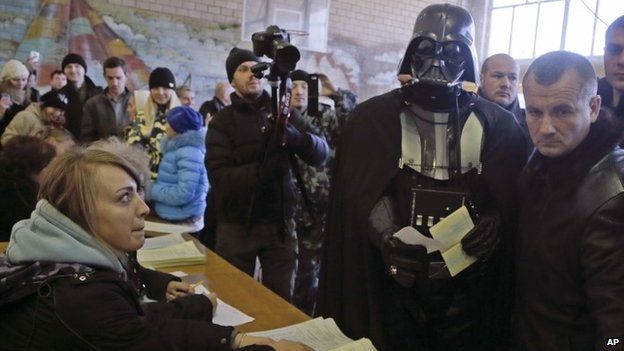 Darth Vader, leader of Ukraine Internet Party, at polling station in Kiev - 24 October