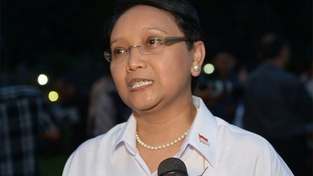 Indonesian Foreign Minister Retno Lestari Priansari Marsudi speaks to journalists after cabinet announcement at the presidential palace in Jakarta