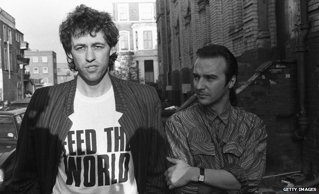Bob Geldof and Midge Ure outside SARM Studios in Notting Hill, London, during the recording of the Band Aid single Do They Know It's Christmas?
