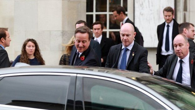 Mr Cameron entering his car after the incident