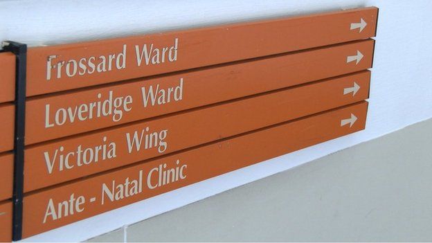 Sign in the Princess Elizabeth Hospital pointing to the Loveridge Ward, which is the maternity ward