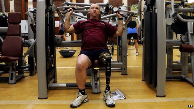 British army Paratrooper Sergeant Stuart Pearson, who lost a leg in a landmine explosion in gymnasium