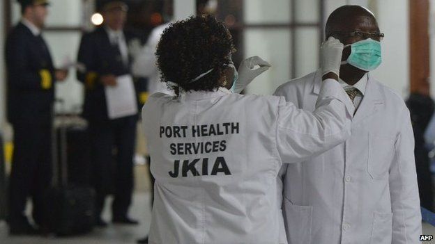 Kenyan health officials prepare to receive arriving passengers at an Ebola observation area at the Jomo Kenyatta International Airport in Nairobi (28 October 2014)