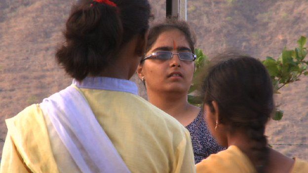 Prachi (facing camera) addresses a group of Durga Vahini girls