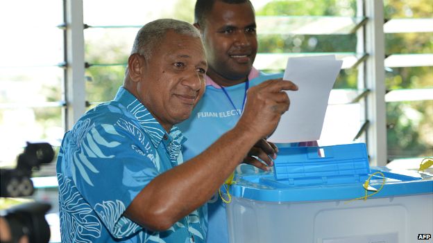 Frank Bainimarama casts his vote in the capital Suva during Fiji's elections - 17 September 2014