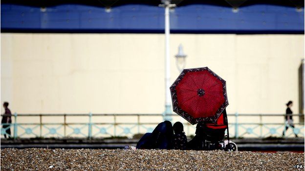 People enjoy sun at Brighton Beach