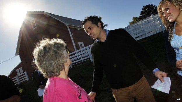 Greg Orman, the Independent candidate for U.S. Senate, talks to supporters before delivering remarks about his “All of Kansas” plan, supporting rural areas of the Sunflower State, during a campaign stop at a farm near Lawrence, Kansas 29 October 2014