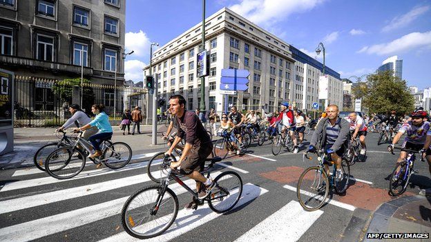 Belgians riding bikes on car-free-Sunday