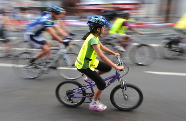 Child cycling in London