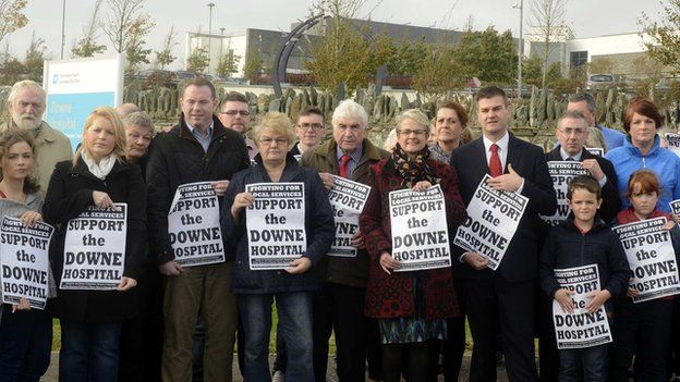 Protesters held a demonstration outside the Downe Hospital in Downpatick on Thursday, one of several hospitals affected by dozens of temporary bed closures