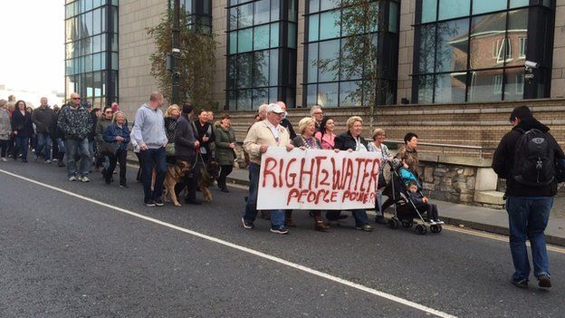 Hundreds of people attending a protest in Ringsend, Dublin