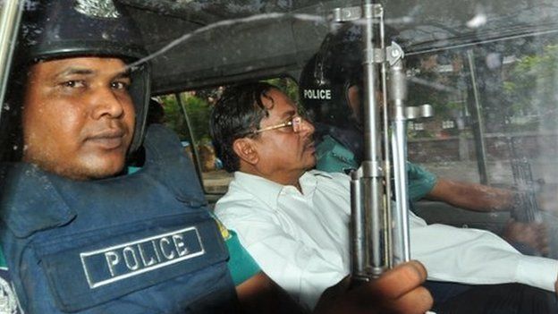 Mohammad Kamaruzzaman deputy head of the Jamaat-e-Isami Political Party being driven either to or from Dhaka Court.