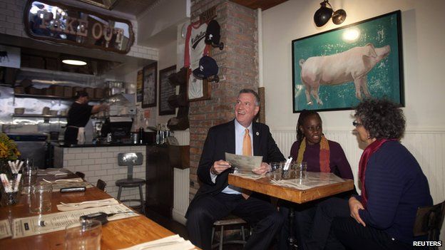 New York Mayor Bill de Blasio, his wife Chirlane McCray and New York Health commissioner Dr. Mary Travis Bassett (L-R) have lunch at The Meatball Shop in New York October 25, 2014
