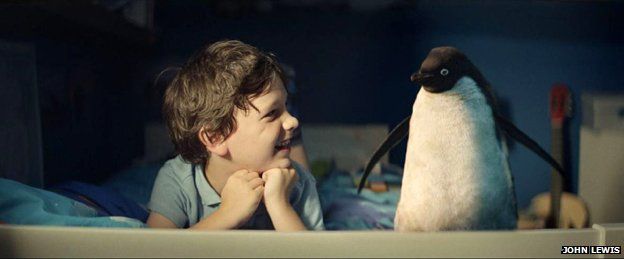 Boy with his penguin friend