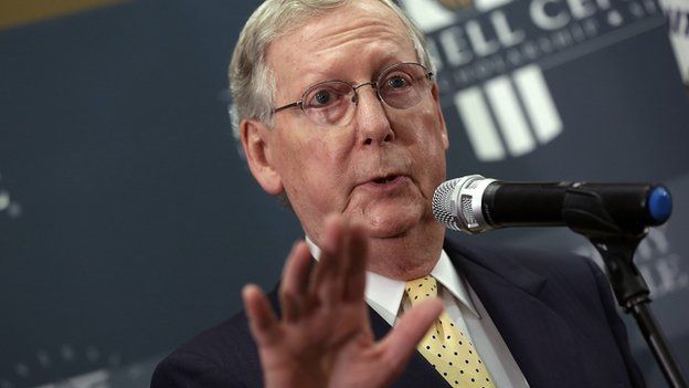 Senate Minority Leader Mitch McConnell speaks at a press conference.
