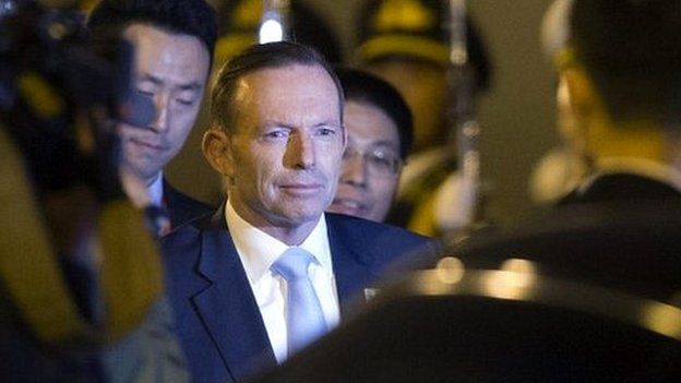 Australian Prime Minister Tony Abbott arrives at the Beijing International Airport - 9 November 2014