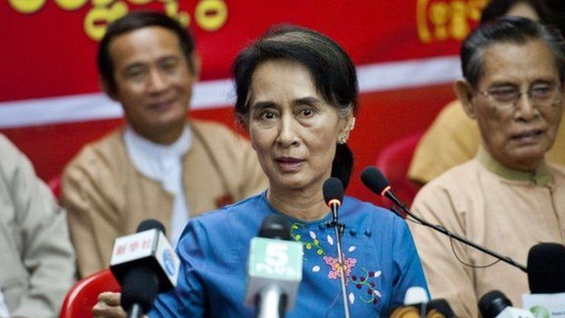Myanmar's pro-democracy leader Aung San Suu Kyi talks to the media during a press meeting at the head office of National League for Democracy party in Yangon on 5 November 2014