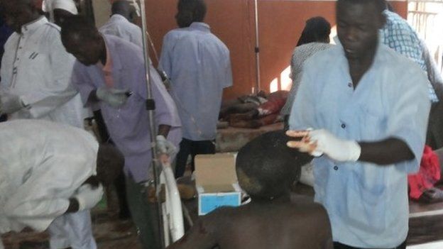 People are treated at the General hospital in Potiskum, Nigeria on 10 November 2014