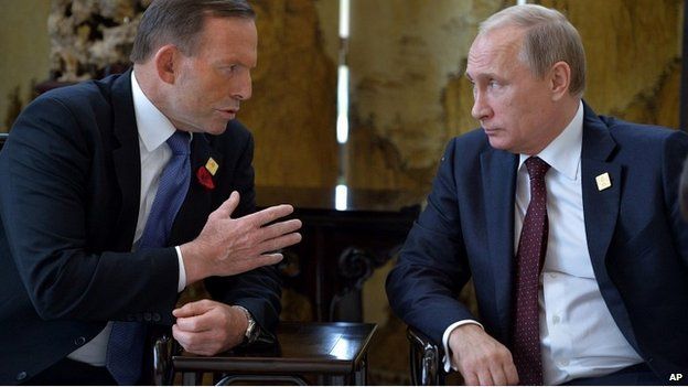 Prime Minister Tony Abbott talks with Russian President Vladimir Putin on the sidelines of the Apec summit in Beijing - 11 November 2014
