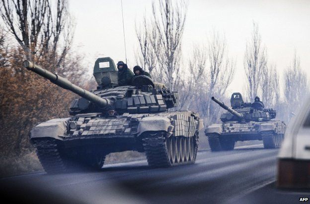 A column of unidentified tanks on a road near rebel-held Shakhtarsk, eastern Ukraine, 10 November