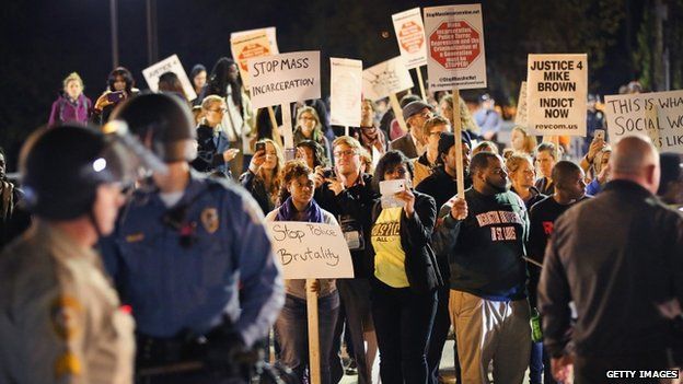 Police face off with demonstrators as protests continue in the wake of 18-year-old Michael Brown"s death on October 22, 2014 in Ferguson, Missouri.