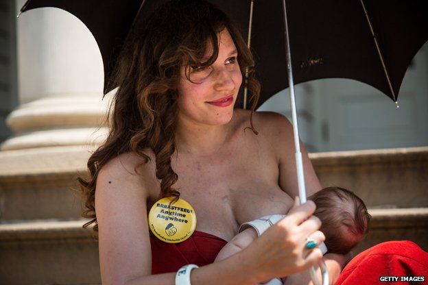 Woman protests for right to breastfeed in public, New York 2014