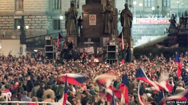 Czechoslovak students wave flags, December 1989 during a protest rally in St. Wenceslas square