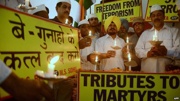 File photo: All-India Anti-Terrorist Front (AIATF) members hold a candlelight vigil as they pay tribute to Congress party members killed in a Maoist attack in the central state of Chhattisgarh, in Amritsar on 27 May 2013