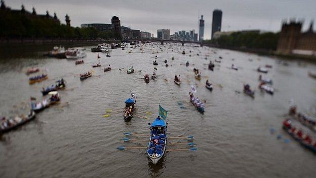 Rowing boats taking part in The Diamond Jubilee Thames Pageant