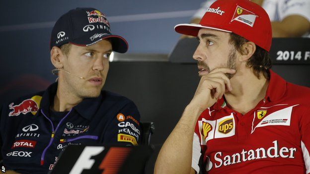 Vettel and Alonso at Thursday's news conference in Abu Dhabi