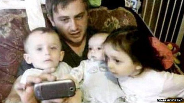 Craig McLelland and his three children