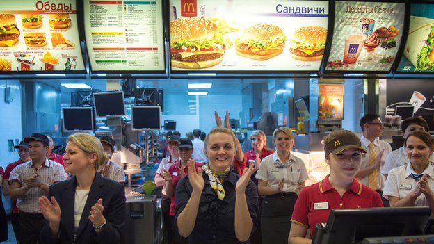 Staff at the Moscow McDonald's applaud its reopening
