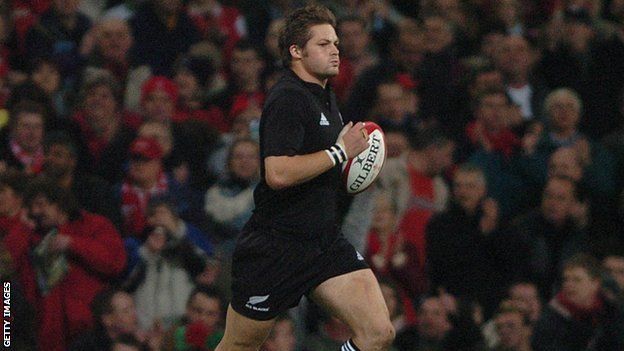 Richie McCaw leads out New Zealand for the first time against Wales in 2004