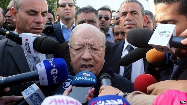 Presidential candidate Beji Caid Essebsi speaks to the media after casting his ballot in Tunis - 23 November 2014