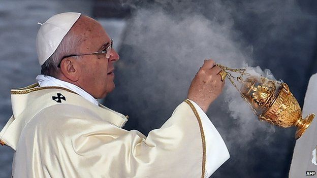 Pope Francis celebrates a canonisation mass on 23 November 2014 at the Vatican.
