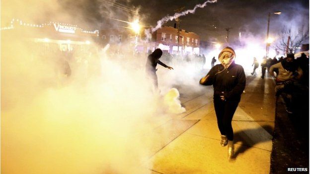 Protesters and tear gas in Ferguson, 24 November 2014