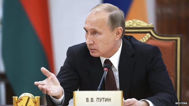 Russian President Vladimir Putin speaking at a summit of Commonwealth of Independent States leaders in the Belarusian capital Minsk in October 2014