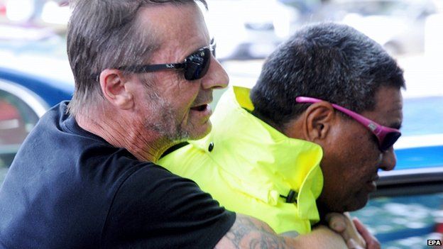 Phil Rudd leaves the District Court in Tauranga, New Zealand, 26 November 2014
