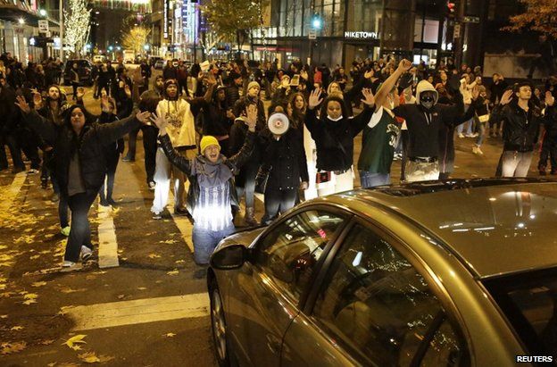 Protesters in Seattle block a road, 25 November