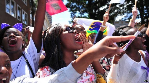 Women rally in protest on 17 November in Kenya's capital, Nairobi, about the stripping of a woman by a mob .