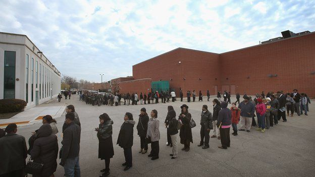 People queue at a job fair in Chicago, 2012
