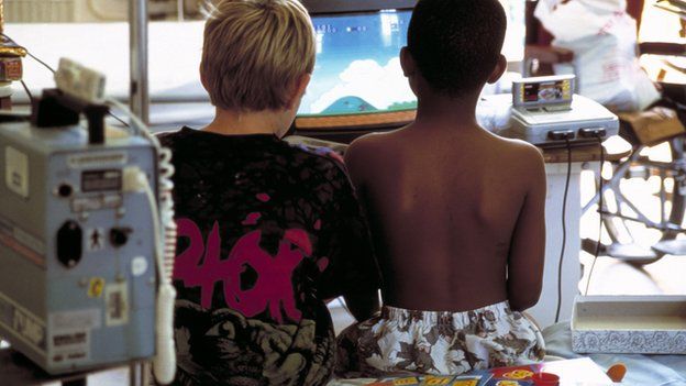 Children playing a computer game in hospital