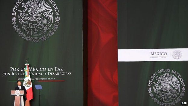 Mexico's President Enrique Pena Nieto delivers a speech during a national broadcasting message from National Palace in Mexico City, Mexico, 27 November 2014