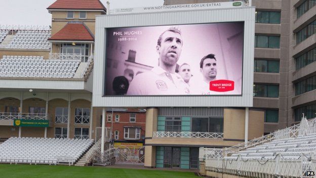 A tribute to Australian cricketer Phillip Hughes is displayed on the big screen at Trent Bridge, Nottingham
