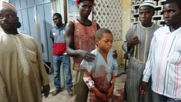A young boy injured in the mosque attack arrives at local hospital