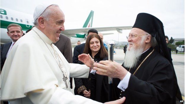 Pope Francis is welcomed by Ecumenical Patriarch Bartholomew I, at the Istanbul Ataturk airport.