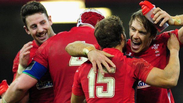 Wales players celebrate after beating South Africa