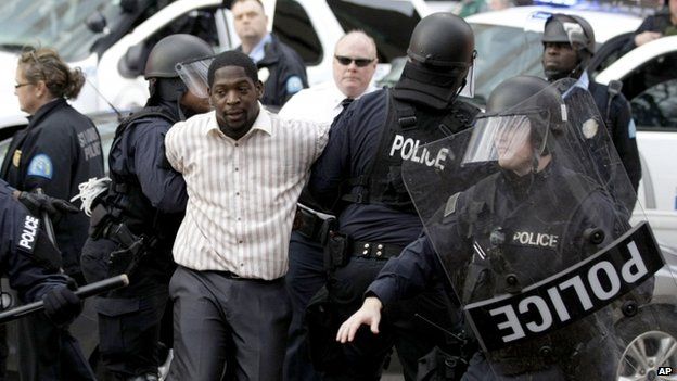 Police arrest a protest organizer in St Louis, Missouri, on 30 November 2014
