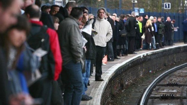 Passengers waiting at London Bridge station